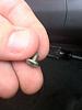 found small screw on driverside floor mat?-img_0273.jpg
