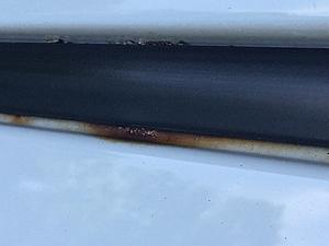 2009 xD Roof Rust under Black Vinyl Roof Strips-img_2579.jpg